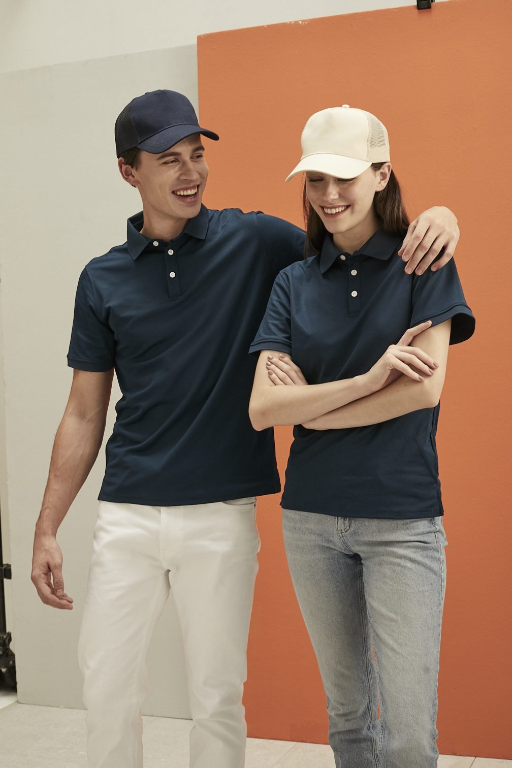 Happy customers wearing matching polo shirts